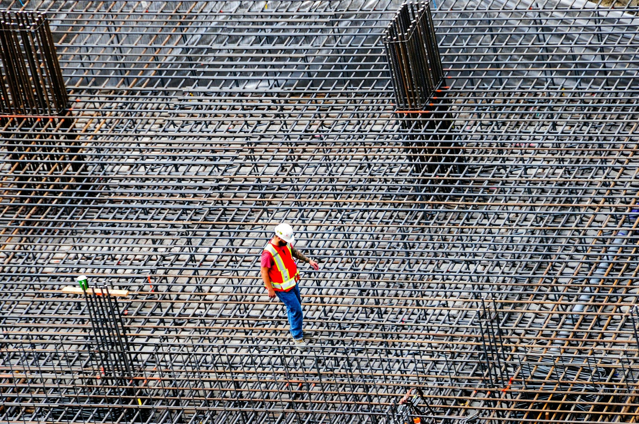 Engineer inspecting works on a large data centre construction site